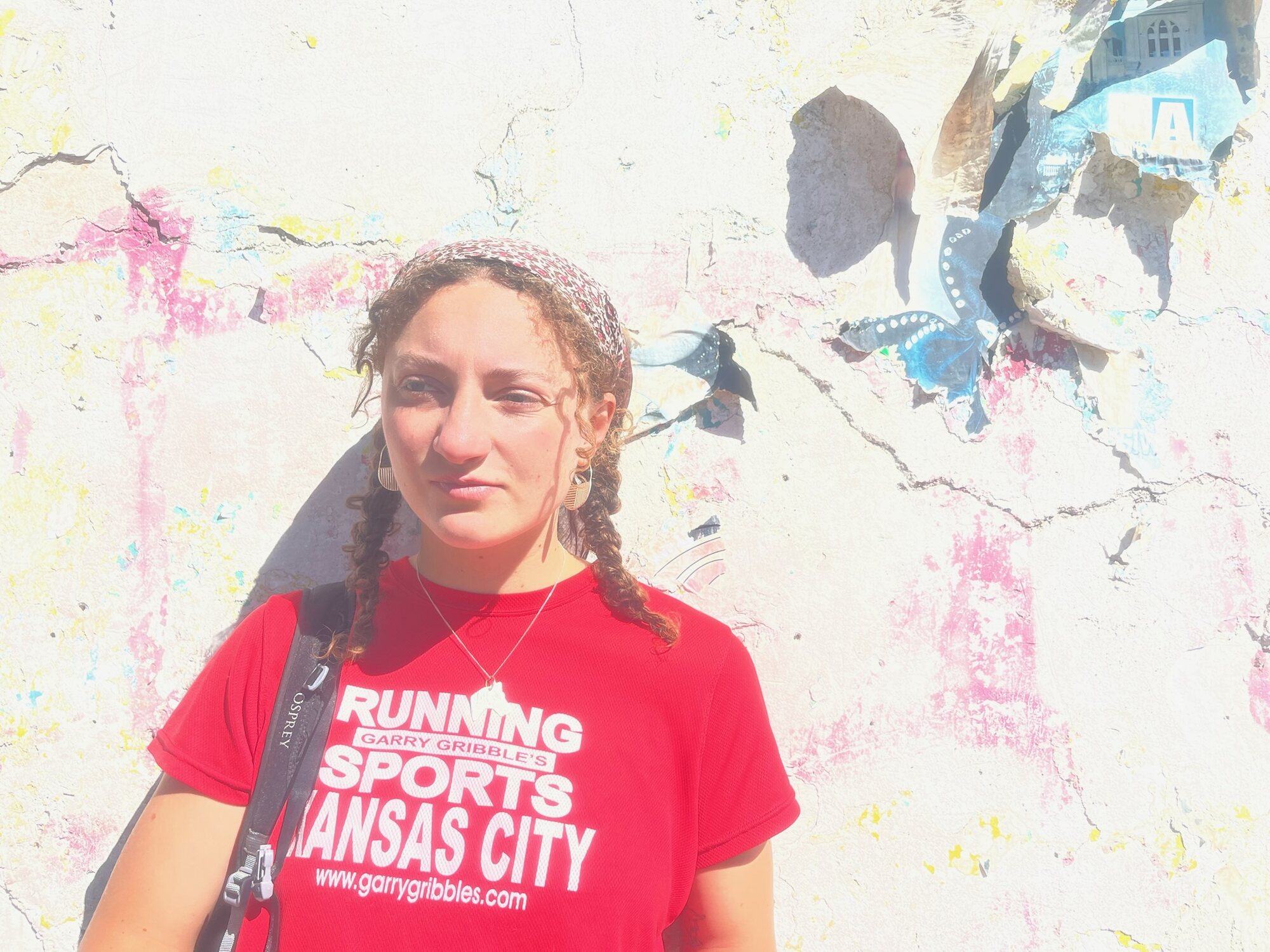 Audrey in front of a painted wall