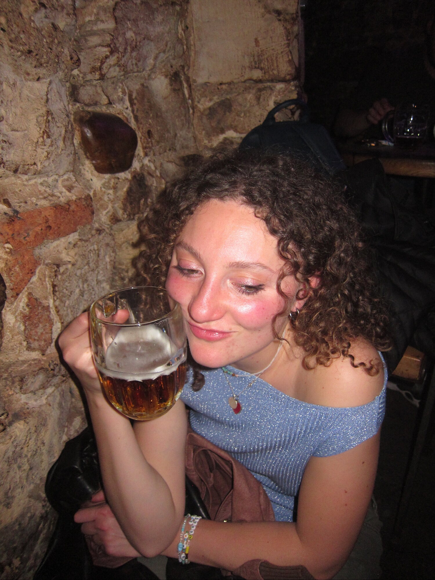 Audrey holding a drink